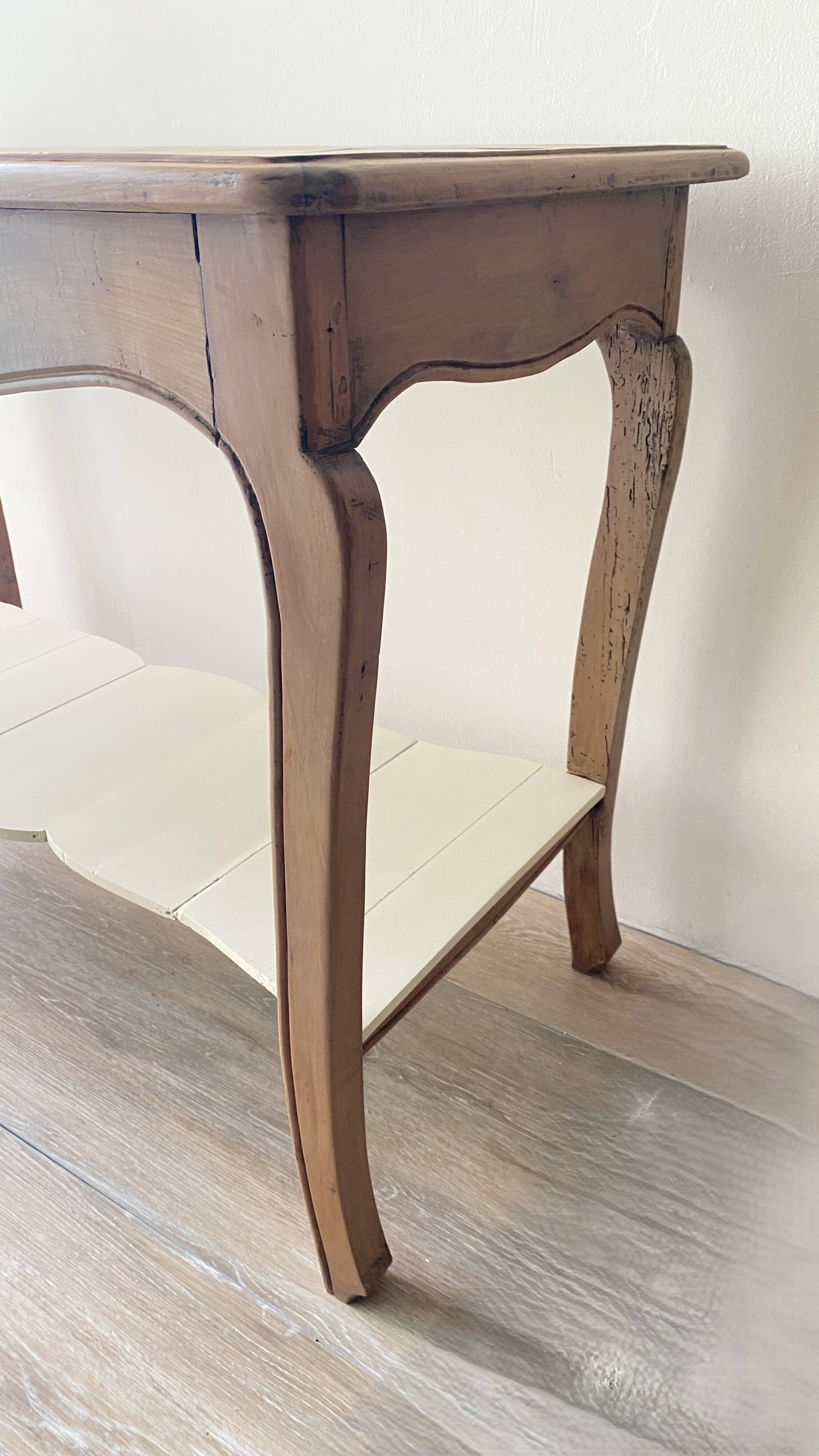 Antique console in solid cherry wood in Louis XV style.