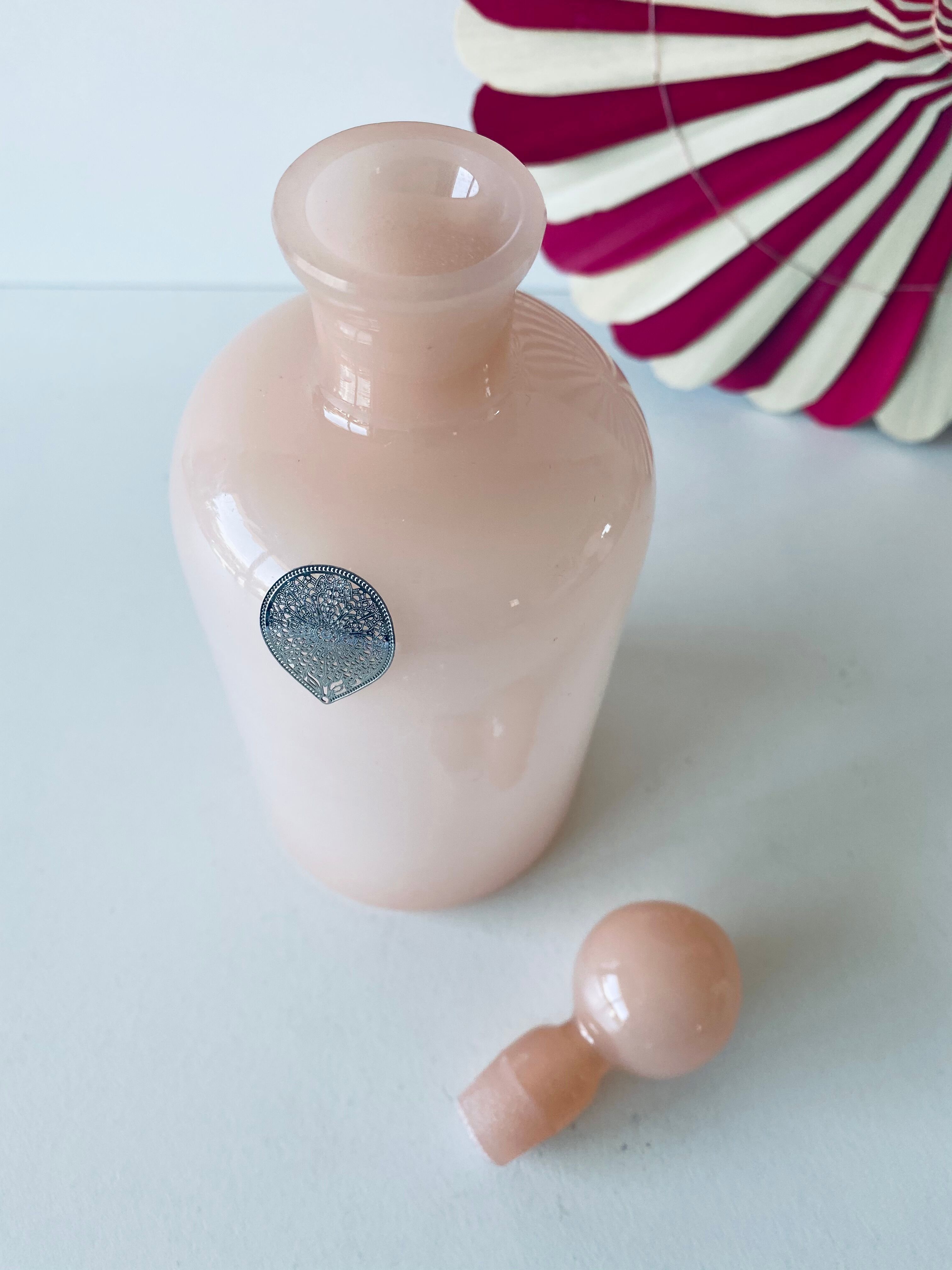 Powder pink opaline flask