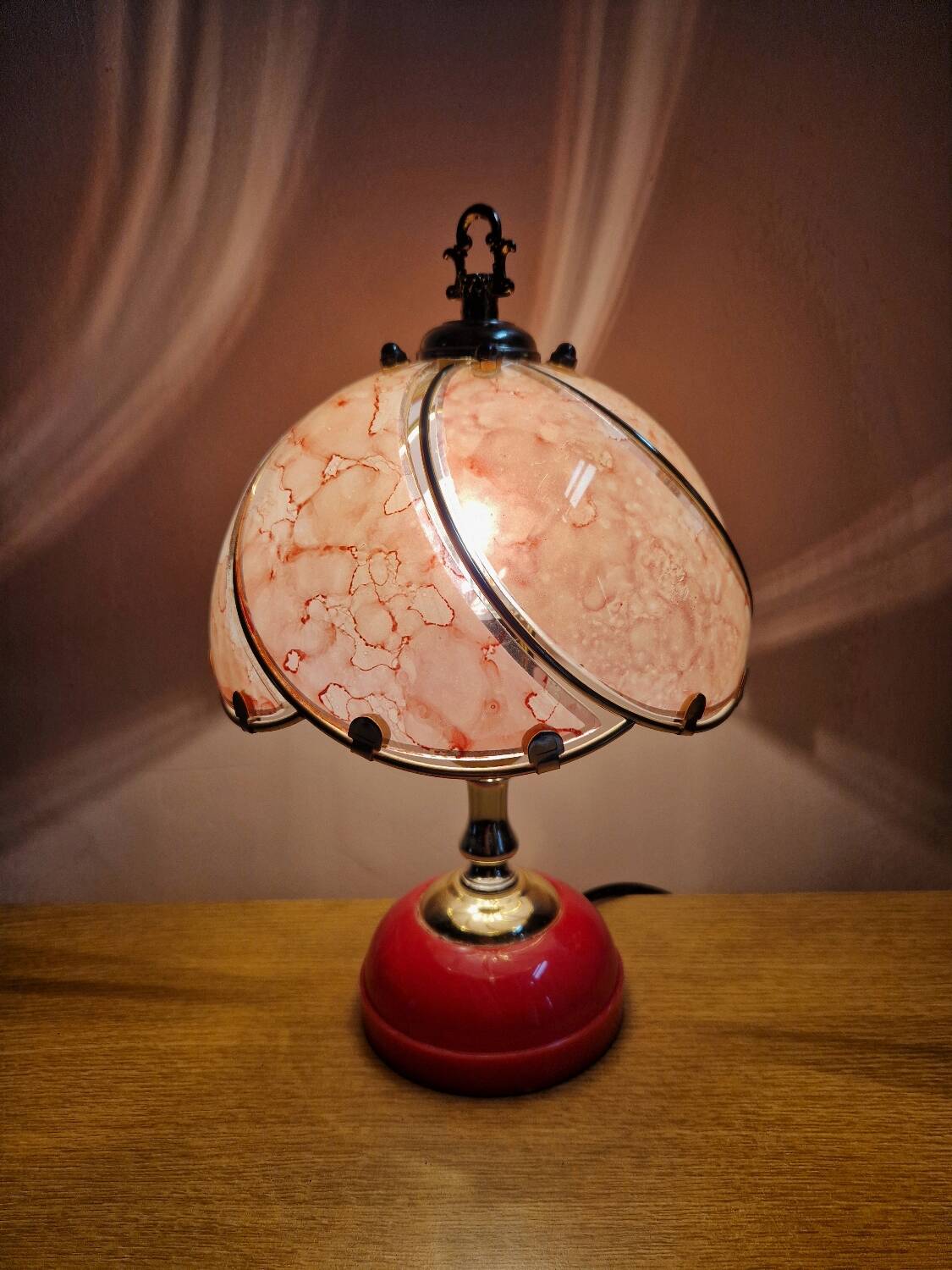 Vintage pink glass globe lamp with brass details and pink base