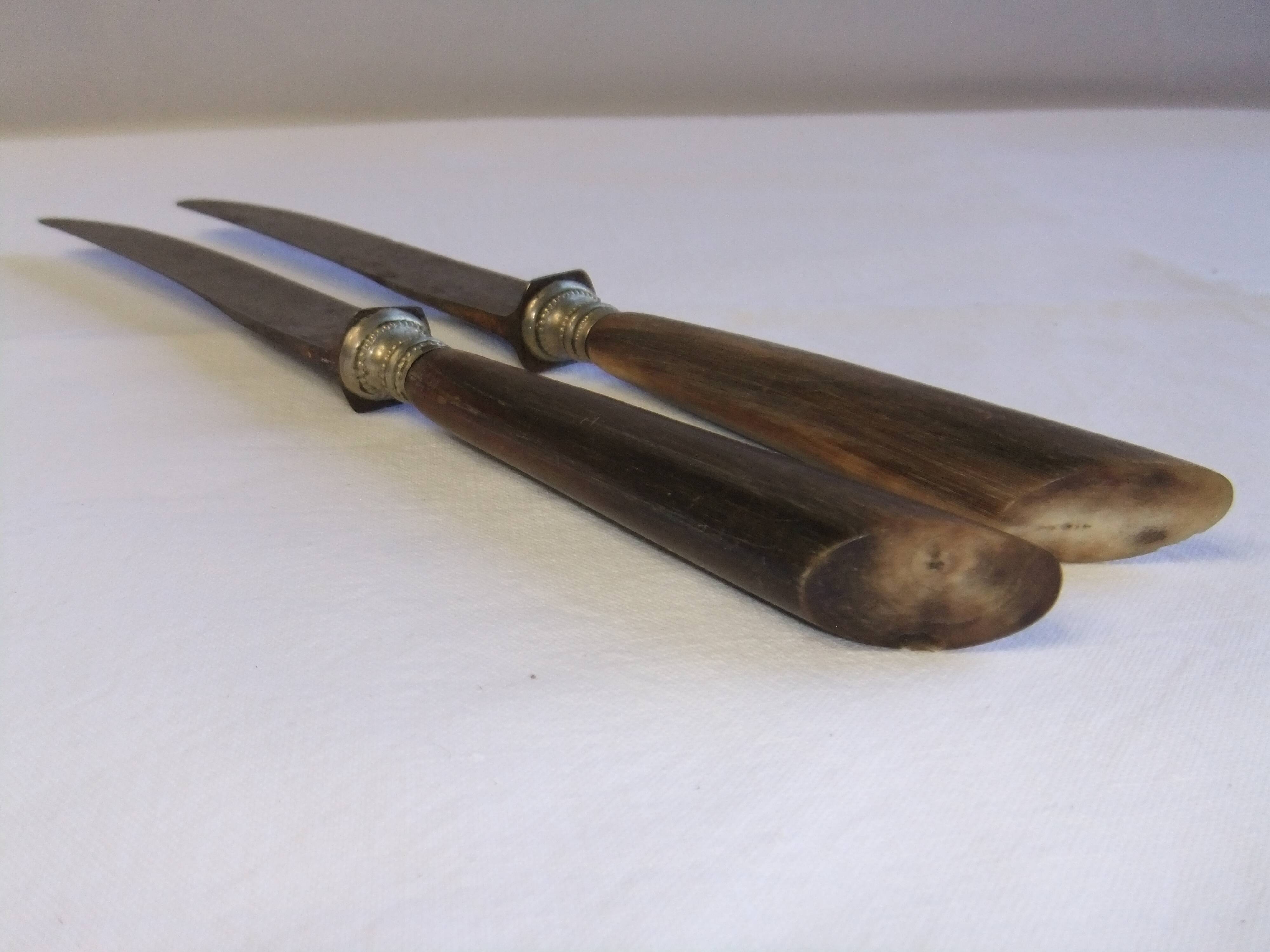 Table service knives old steel blade horn ferrule