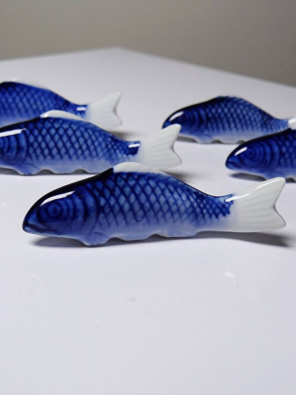 6 porcelain koi carp chopstick/knife rests, China, 1960s-1980s