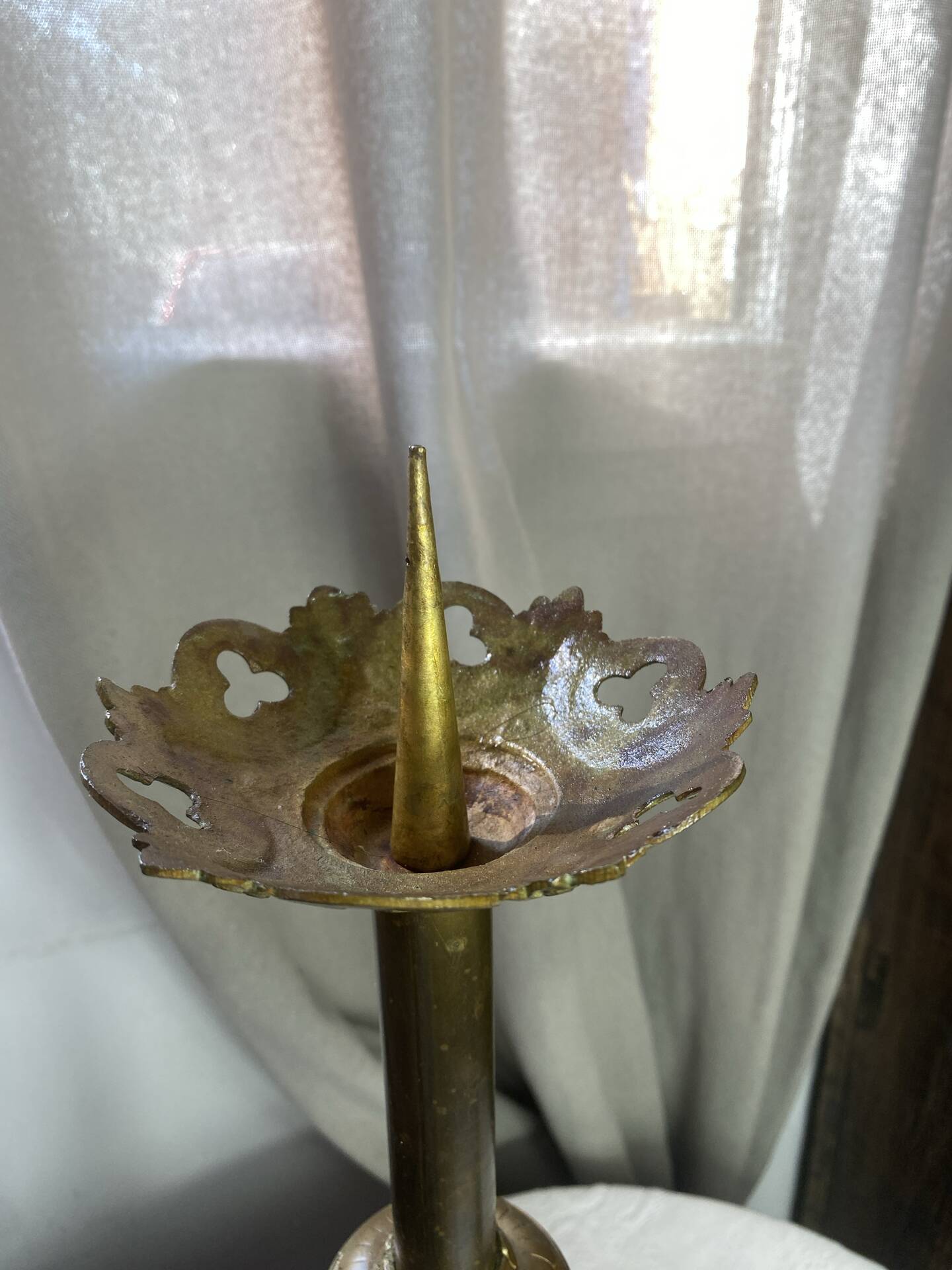 Pair of candlesticks in bronze and brass