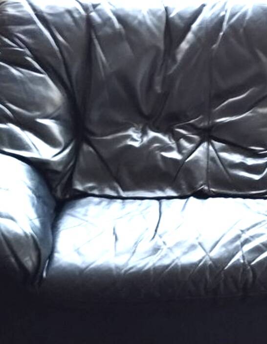 Gerard Guermonprez black leather sofa, cocooning sofa