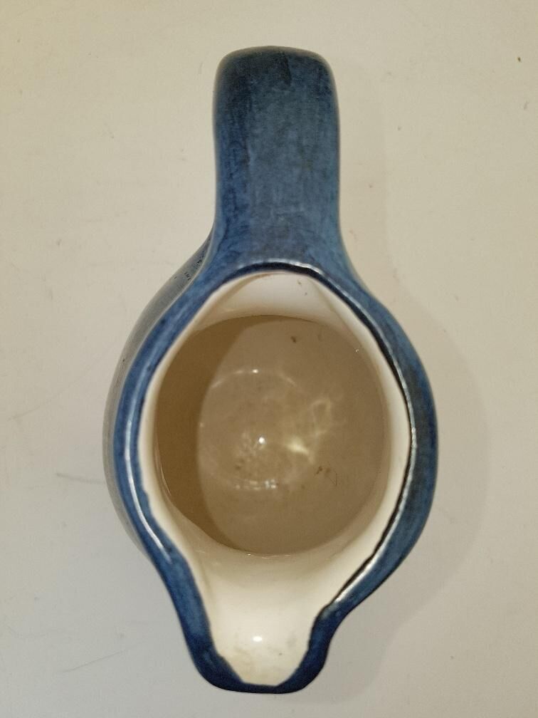 Stocker ceramic pitcher