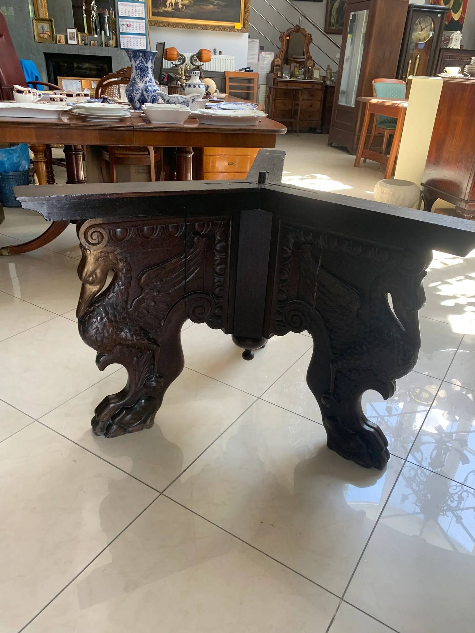 Octagonal oak table, 19th century, griffins