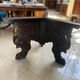 Octagonal oak table, 19th century, with griffins.