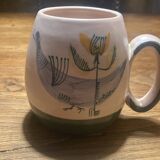 Set of two ceramic mugs signed Yvon ROY