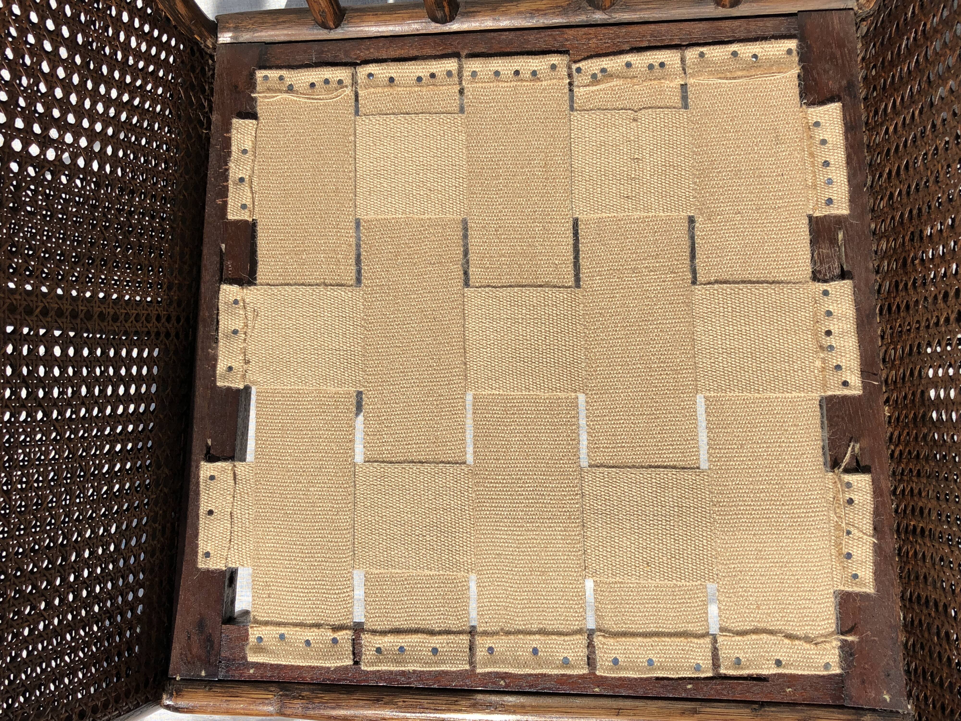 Rattan armchair and cane kok