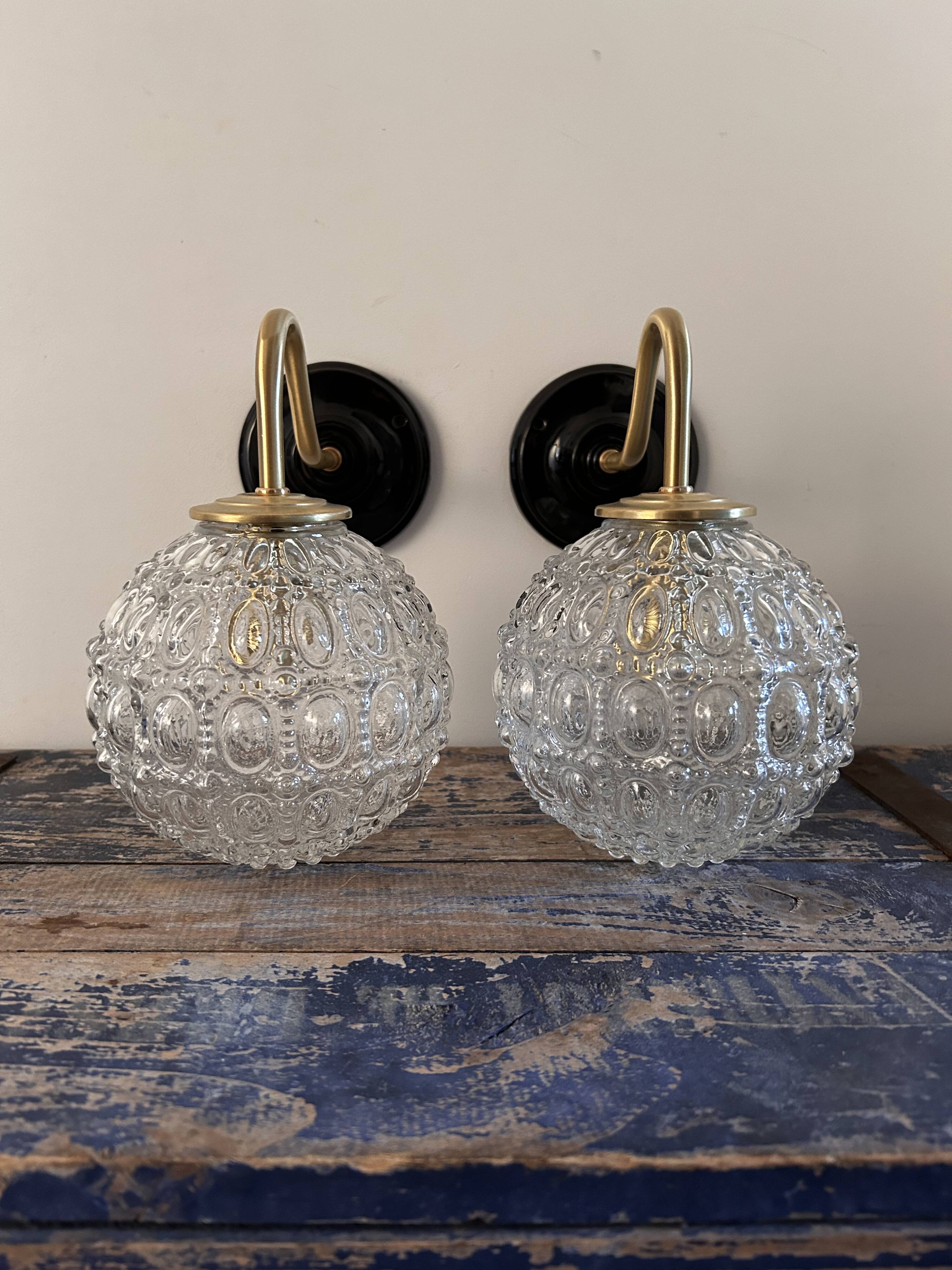 Pair of globe wall lights