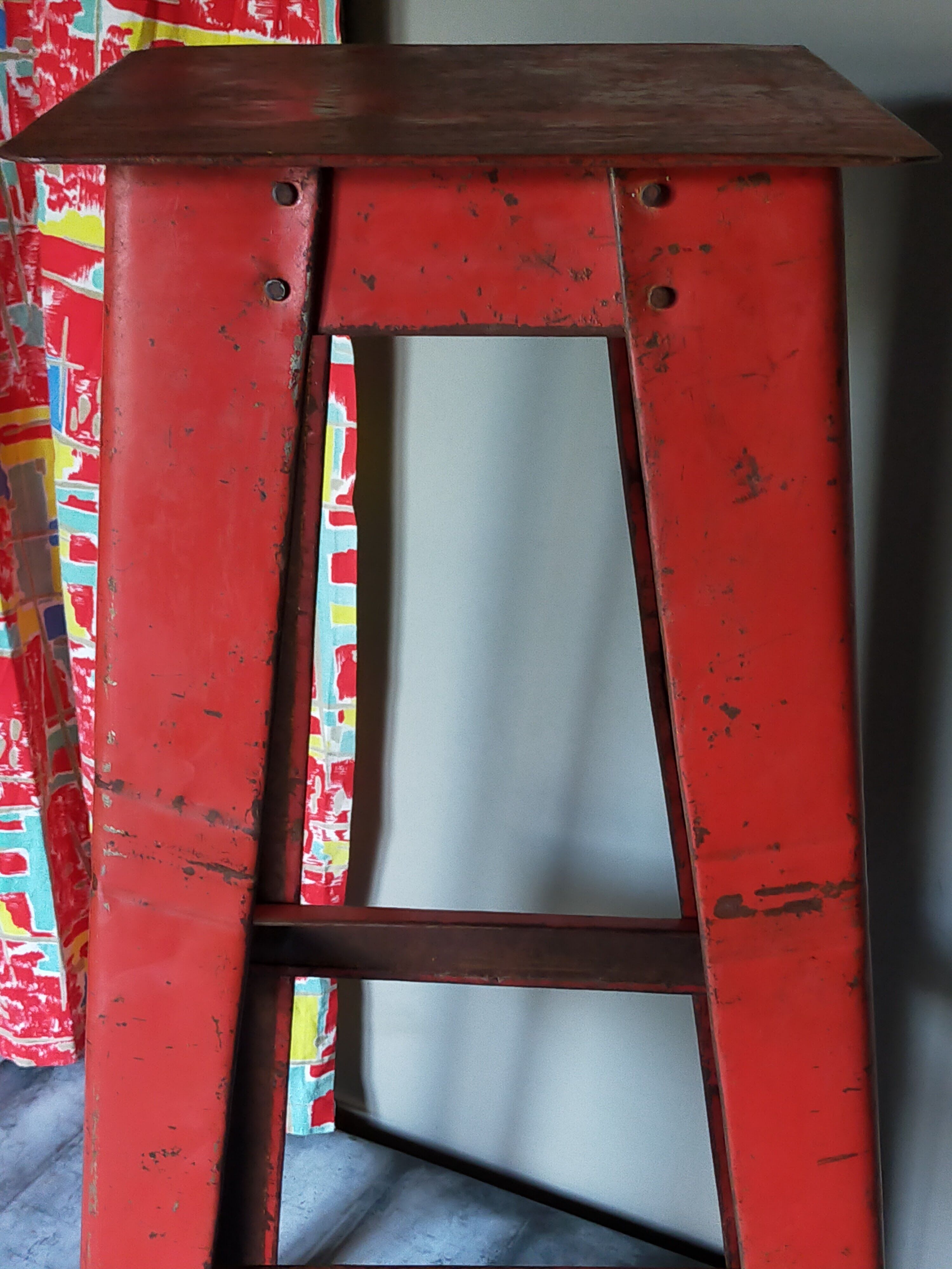 Vintage industrial stool made of recycled sheet metal