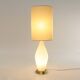 Table lamp in opaline glass and brass with a parchment shade, 1950s.