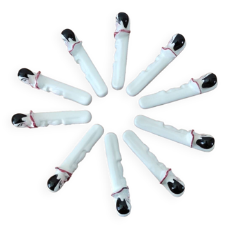 Series of ten Pierrot knife holders