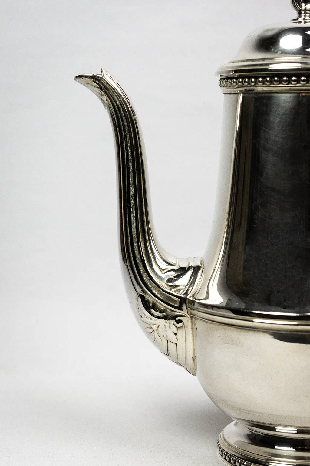 Silver-plated metal coffee pot Ercuis — decorated with bead friezes, ebony handle.