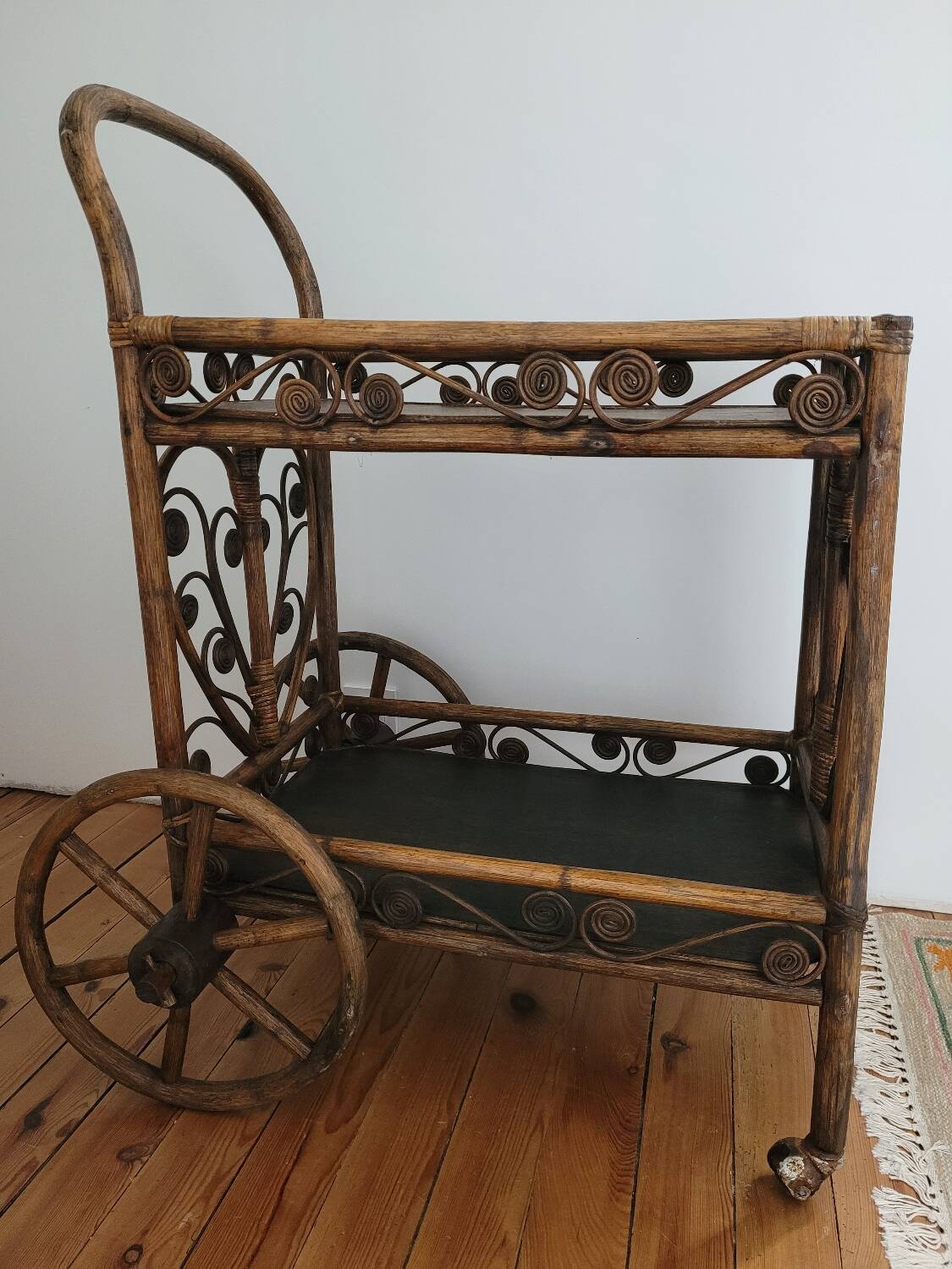 Bamboo and rattan dessert table in peacock style.
