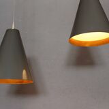 Pair of metal tapered suspensions