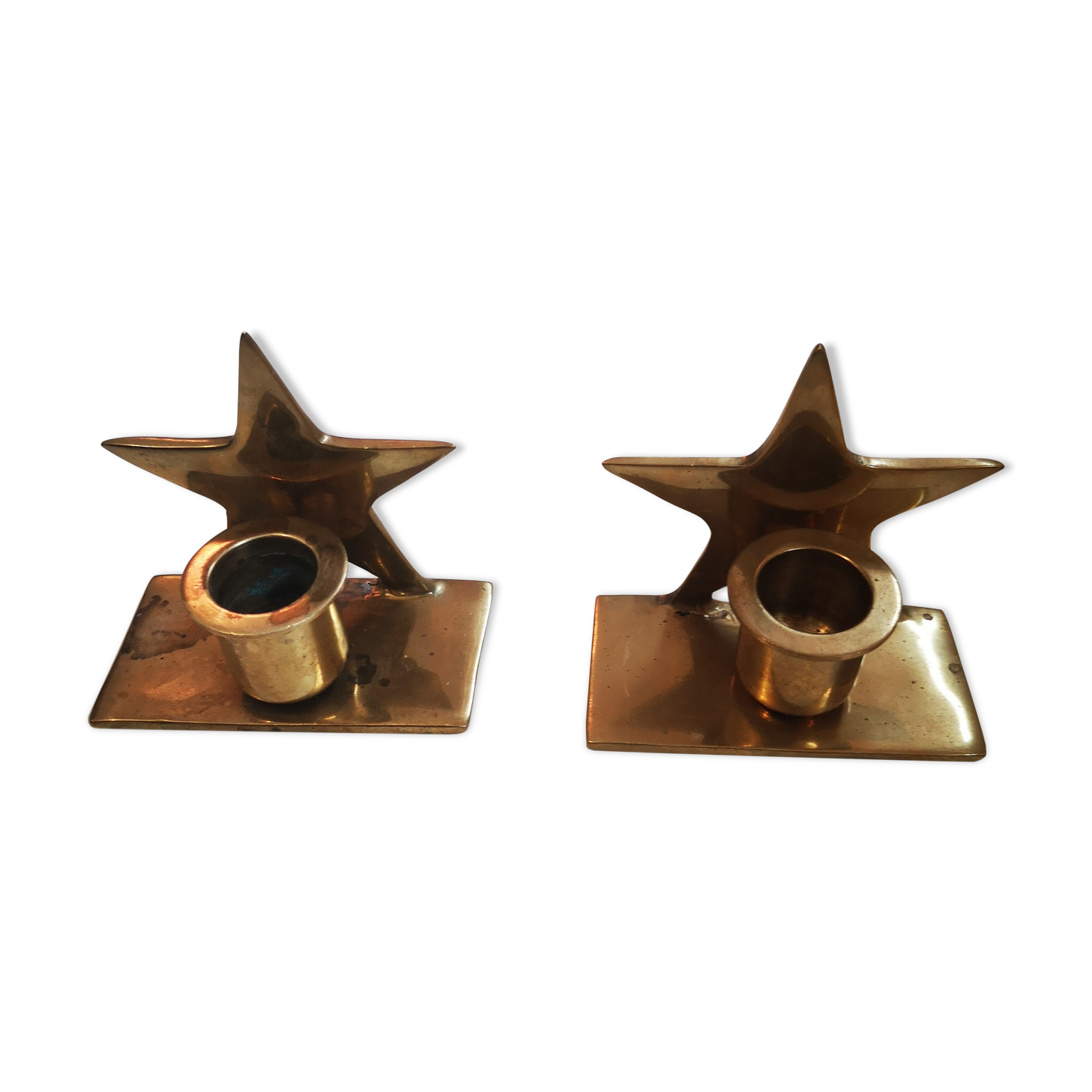 Brass star-shaped candlesticks