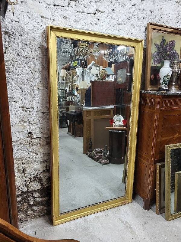 Large gilt mirror in 2 parts from the early 19th century