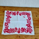 Set of 4 vintage white table napkins with pink flowers.