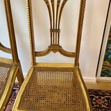 Pair of Louis XVI style fluted gilded chairs