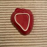 Strawberry Barbotine pocket emptier