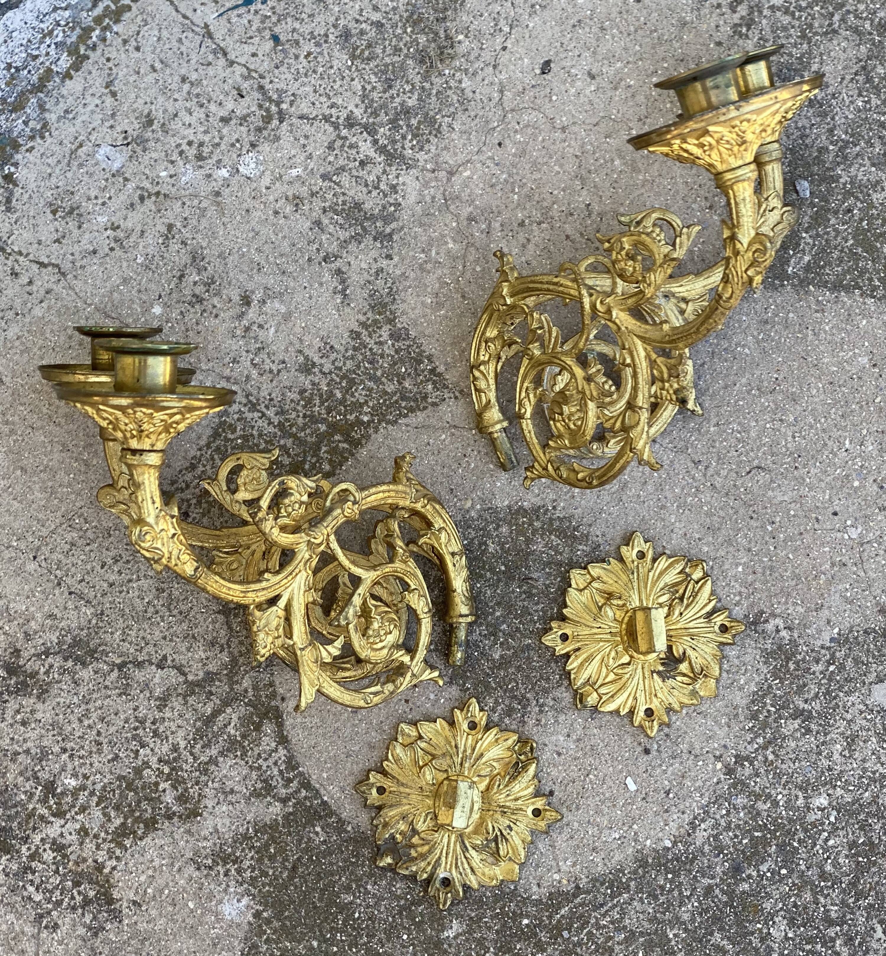 Pair of gilt bronze wall candlesticks