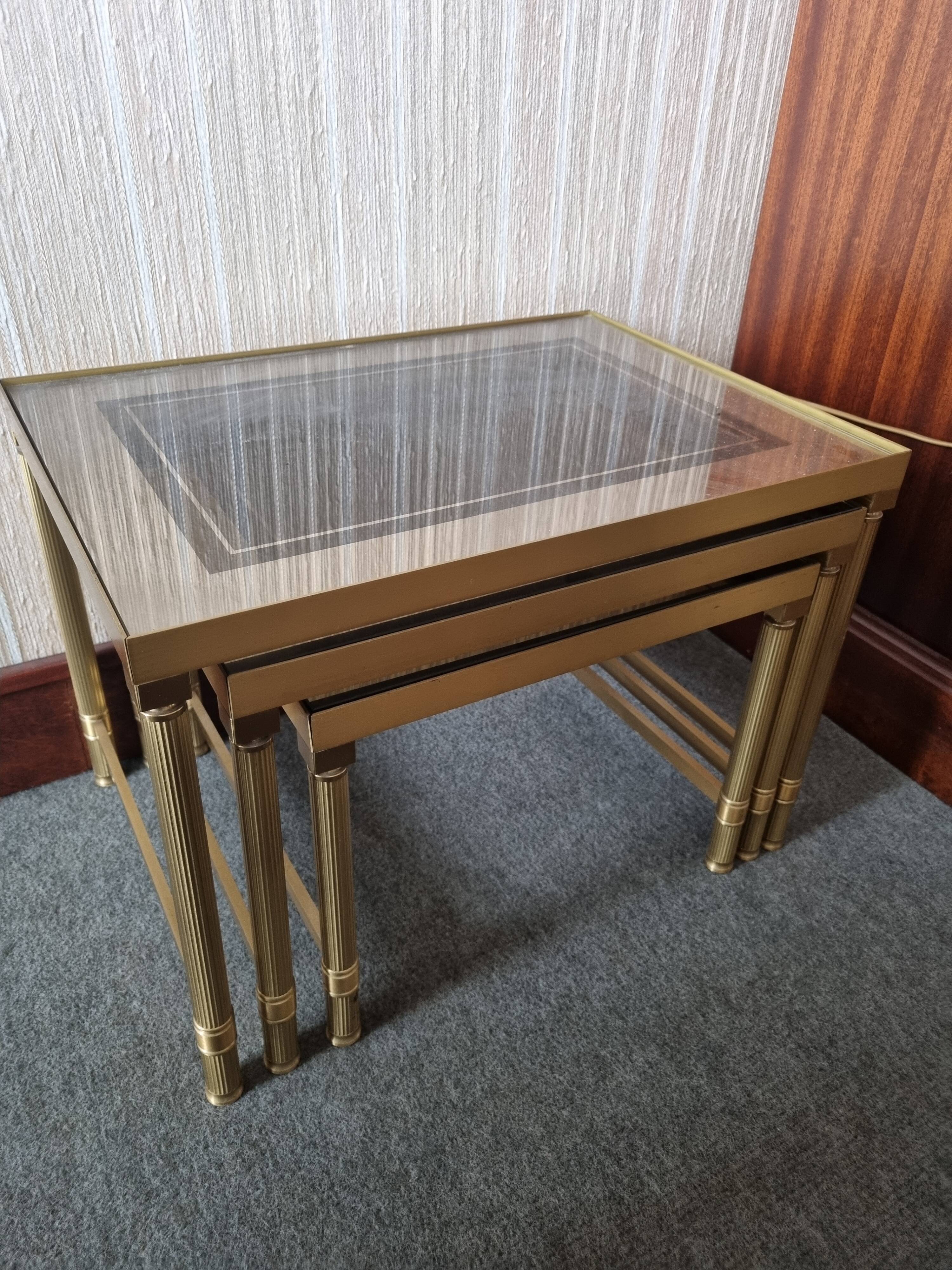 Set of three nesting tables in brass and glass