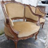 Pair of armchairs basket louis XV in carved walnut
