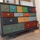 Meuble commode 15 tiroirs tableau patchwork patine ebeniste tout bois massif multicolores