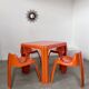 Table and 4 chairs in orange fiberglass design from the 70s Patrick Gingembre Paulus edition