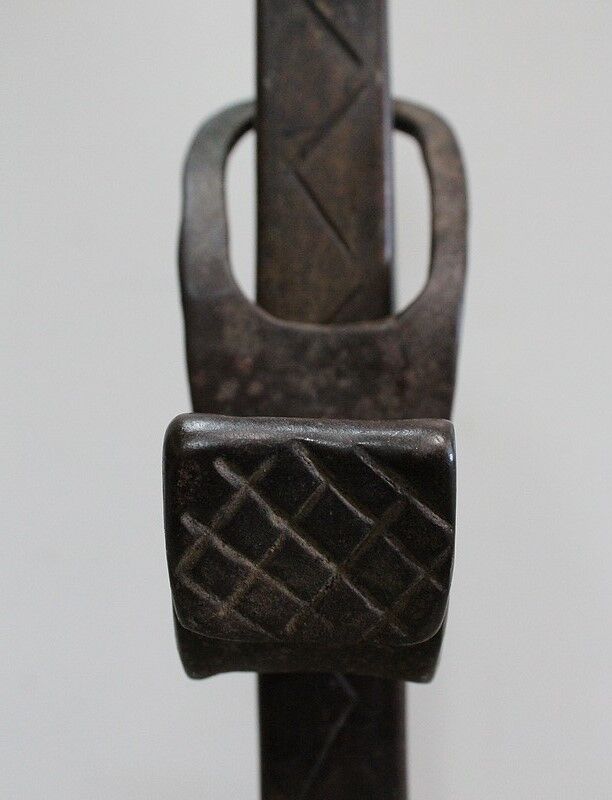 Pair of wrought iron chenets - late nineteenth century