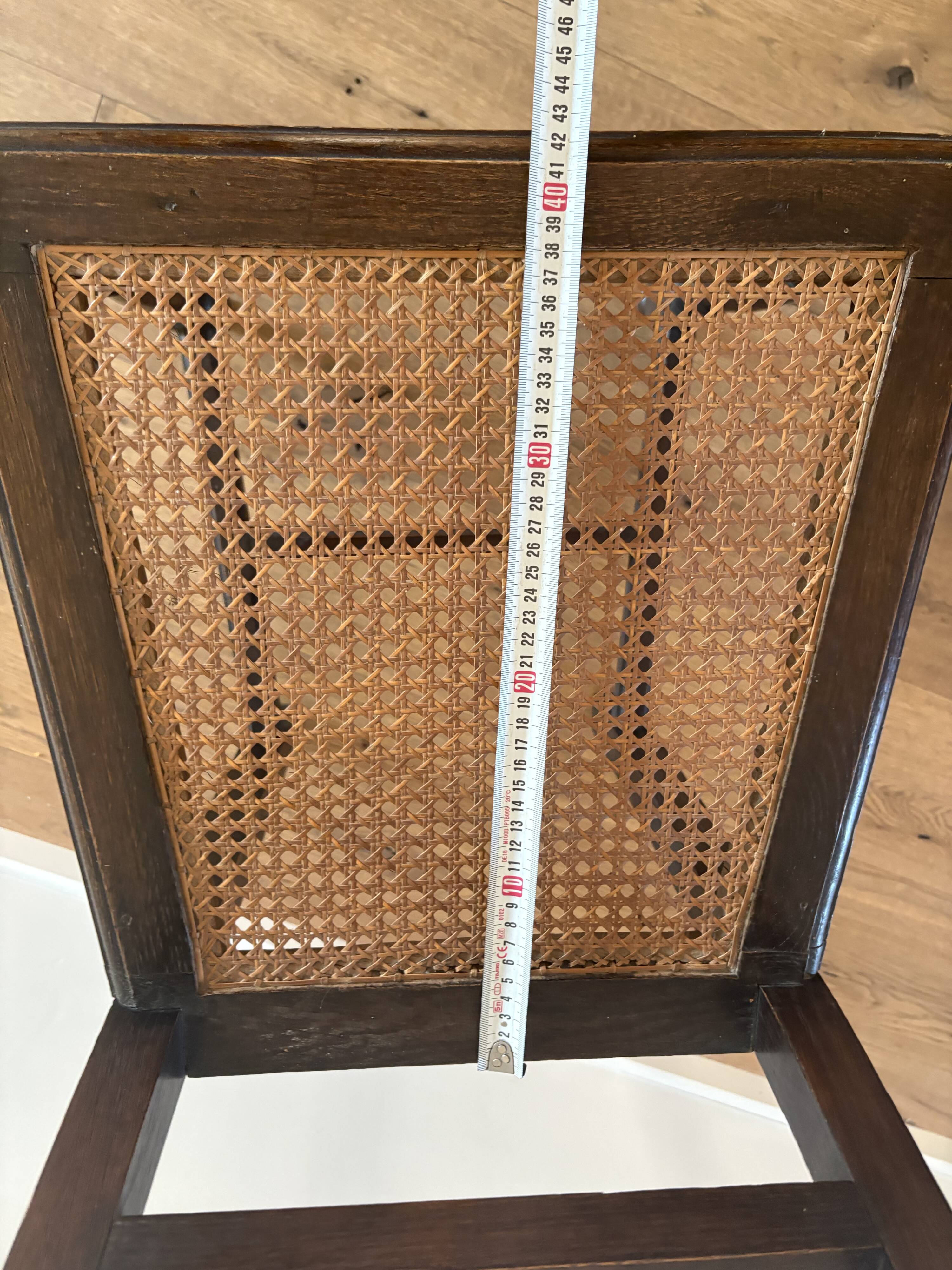 Lot of 4 solid oak chairs with caning in the Henri II style.