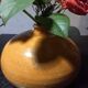 Old enameled terracotta hot water bottle