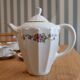 Coffee and tea service in Limoges porcelain with anemone flower pattern and gilding.