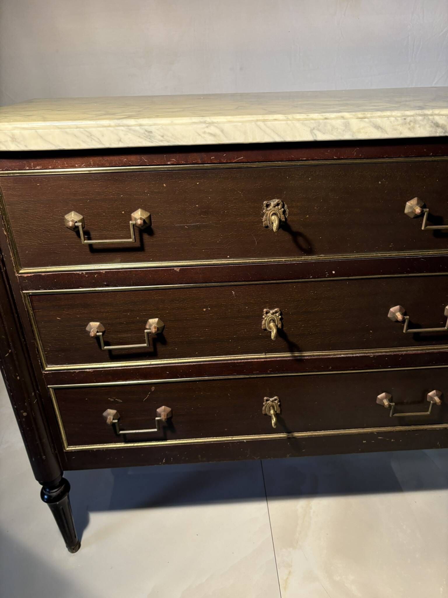 Commode with 3 drawers in Louis XVI style, marble and gilded bronze.
