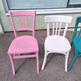 Set of 6 mismatched vintage bistro wooden chairs.