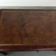 Antique English writing desk from the late 19th century with a warm colour