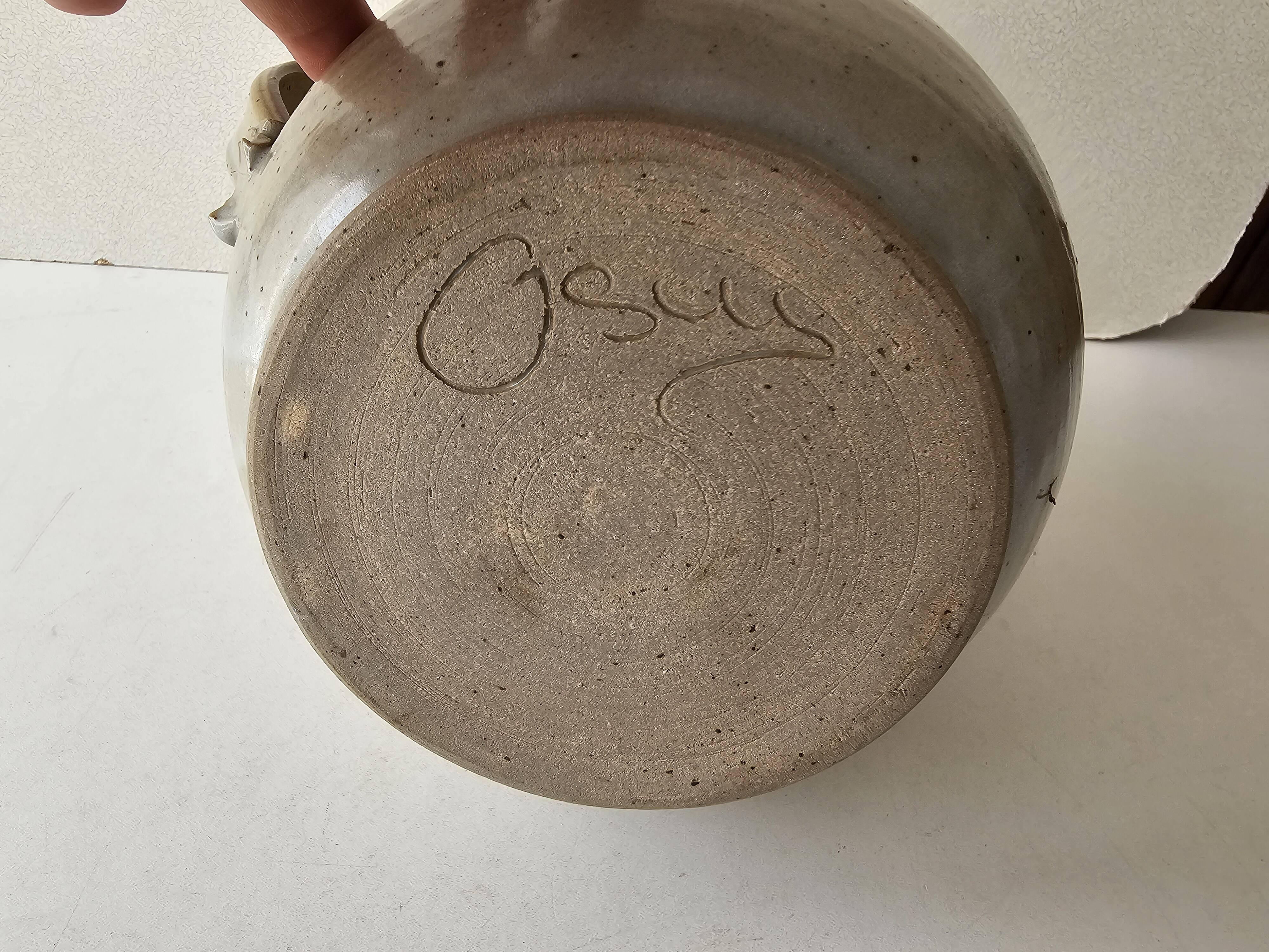 Signed, poured ceramic wine pitcher (signature to be identified)