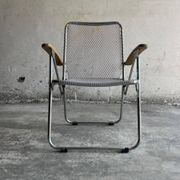Set of two vintage folding chairs with an aluminium wire frame.