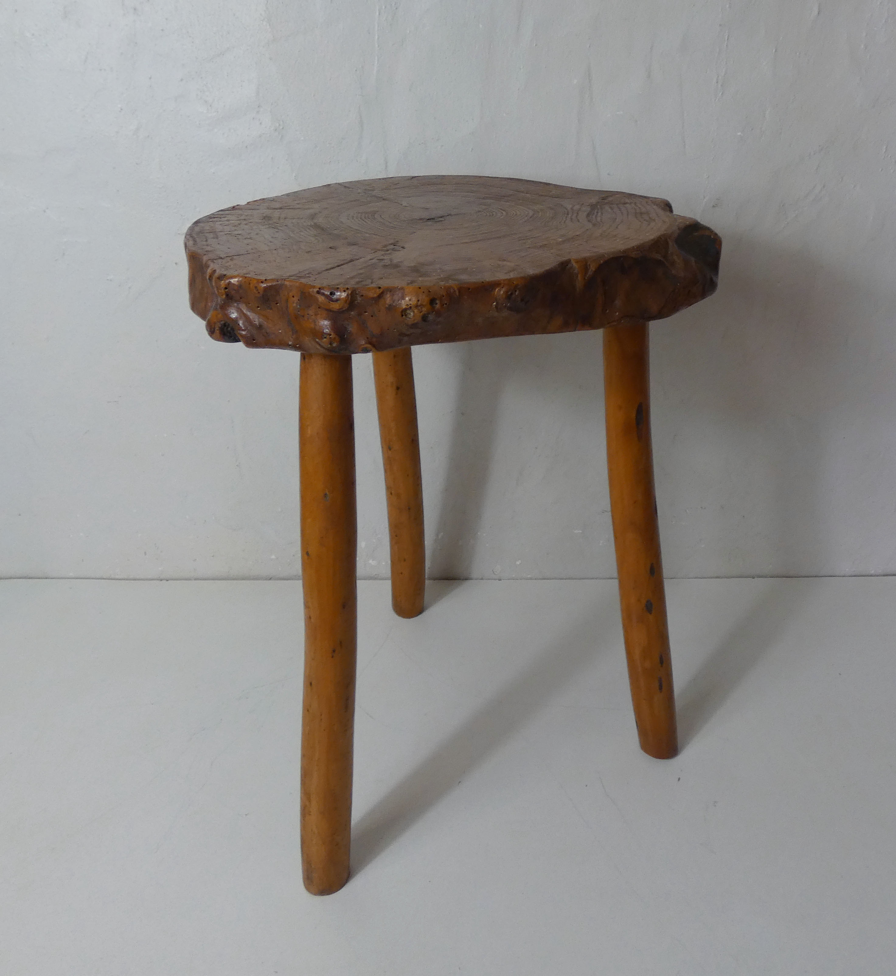 Brutalist side table tripod in vintage wood