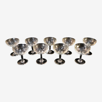 9 champagne glasses in blown and engraved glass