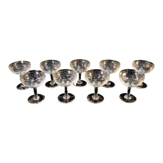 9 champagne glasses in blown and engraved glass