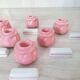 Pink candlesticks and porcelain knife holders