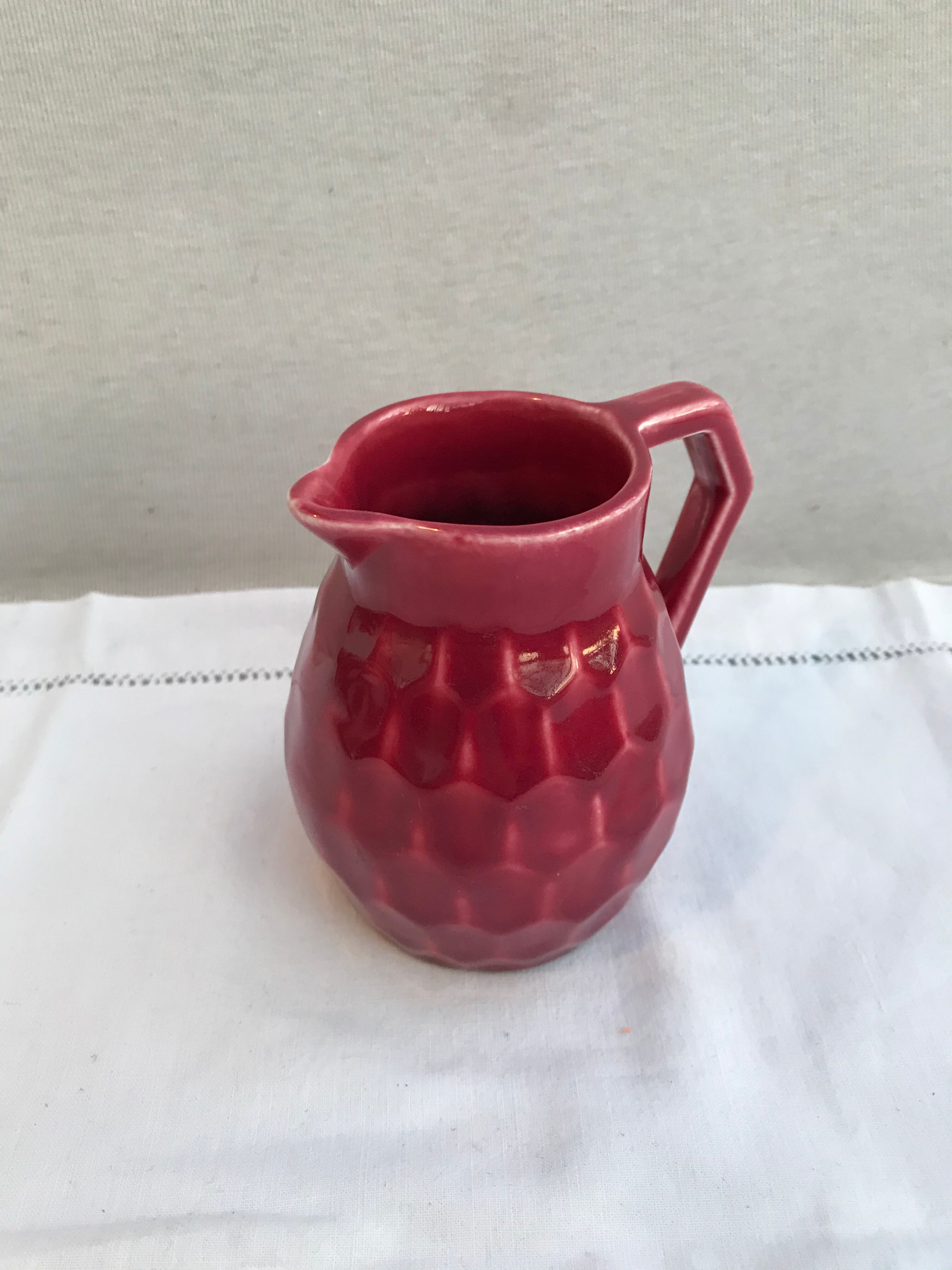 Former art deco red ceramics pitcher