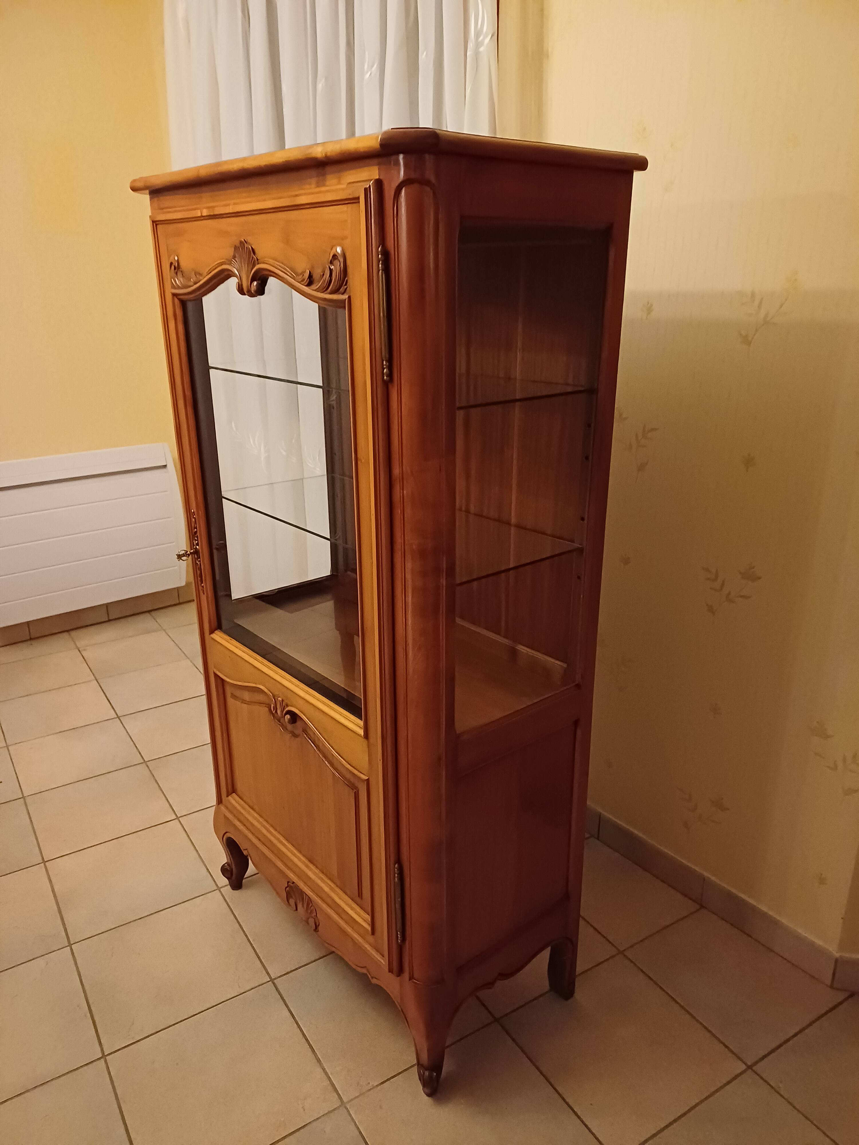 Solid wood display cabinet.