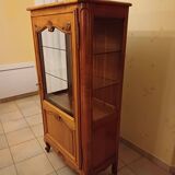 Solid wood display cabinet.