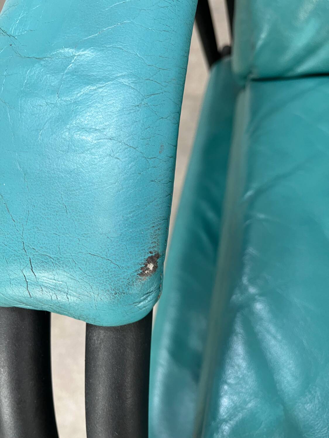 Postmodern design armchair and ottoman, 80s leather