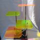 Display shelf with plexiglass trays in 1970s colours.