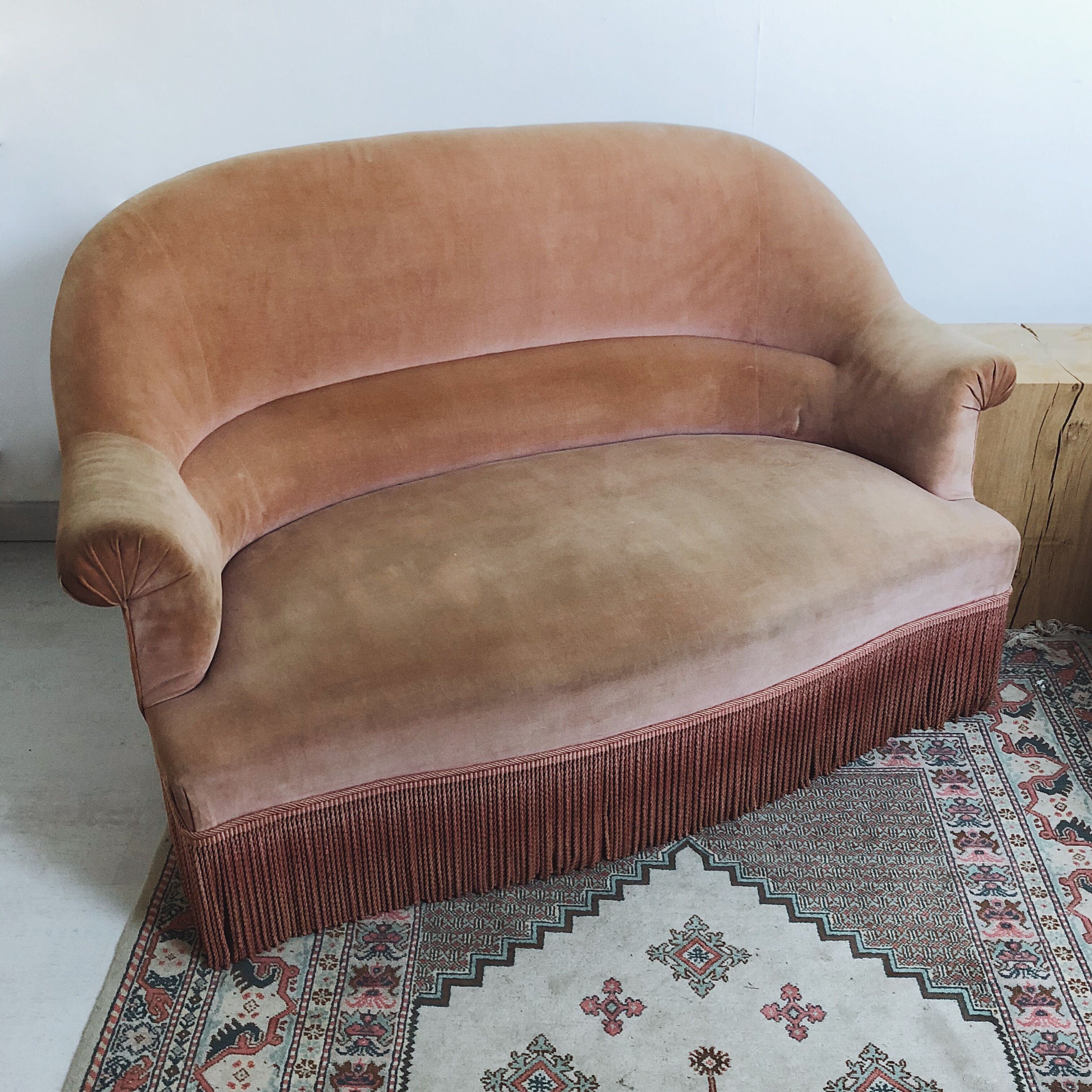 Pink velvet sofa