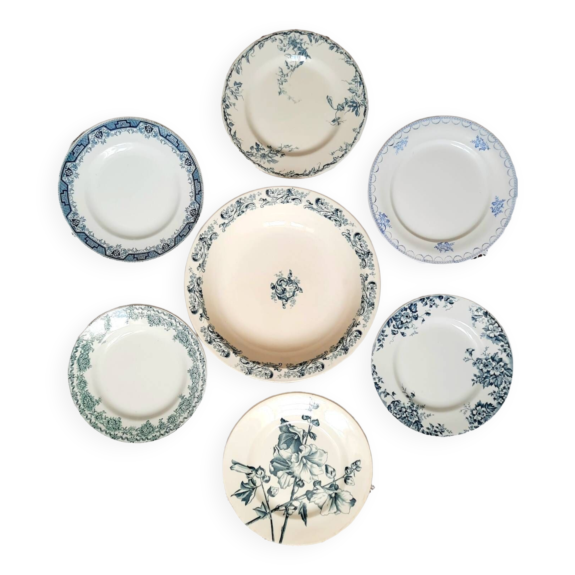 Old mismatched dinner plates accompanied by a dish