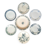 Assiettes plates anciennes dépareillées accompagnées d'un plat